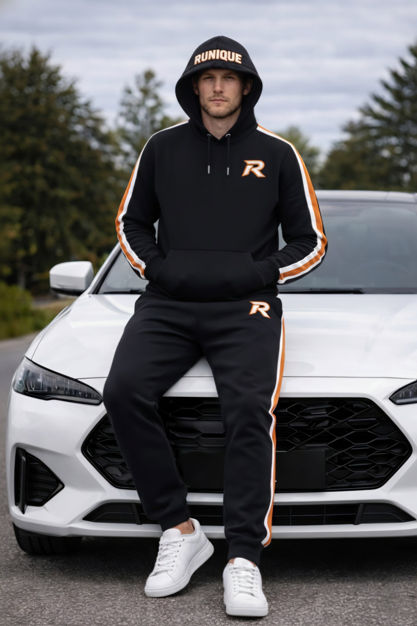 RUNIQUE Heritage Tracksuit – Black & Orange Signature Edition